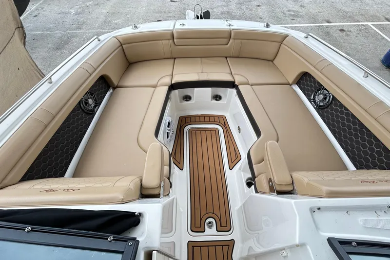 2022 Sea Ray 290 Sdx @ Cancun "angulo" Yacht Photos Pics 2022 Sea Ray SDX 290 boat interior with tan seating and wood accents.