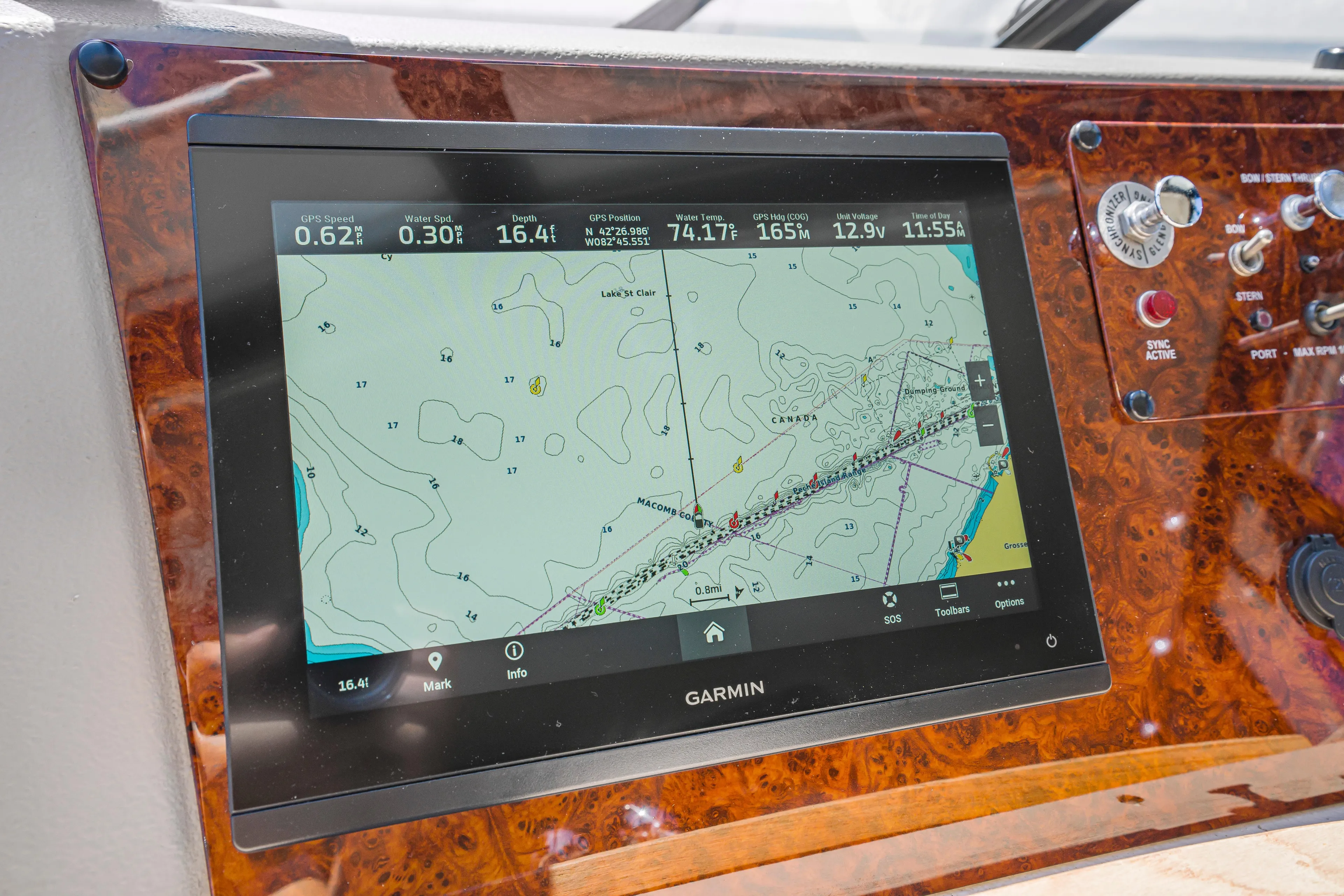 Never Say Never Yacht Photos Pics Garmin navigation display on 1997 Bayliner 4788 Pilot House Motoryacht dashboard.