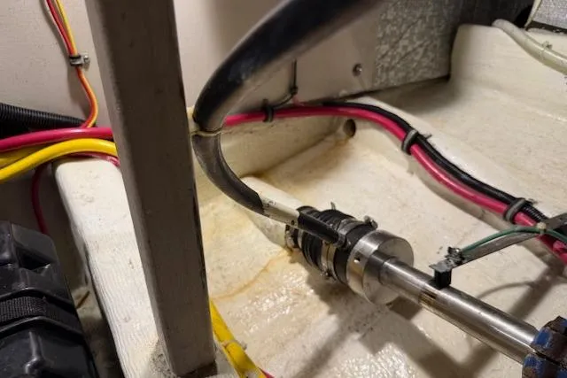 Ocean Baron Yacht Photos Pics Engine room of 2001 Sabreline Sedan with visible wiring and piping.