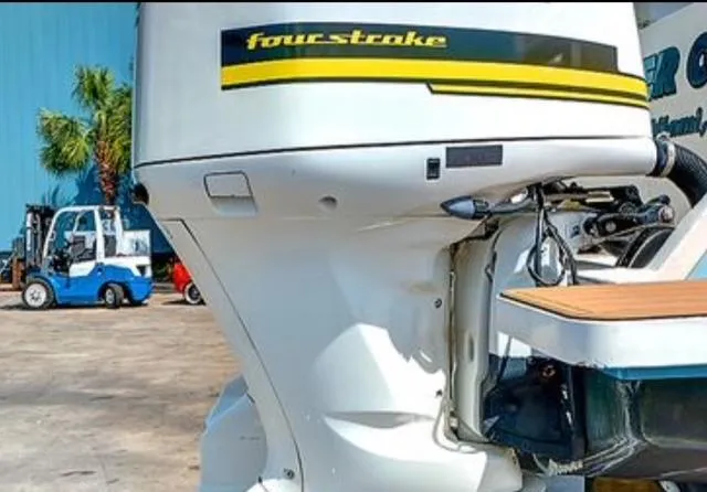  Yacht Photos Pics Outboard motor on a 2008 Intrepid 370 Cuddy boat, featuring four-stroke engine.