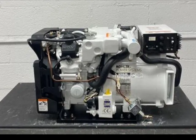  Yacht Photos Pics Kohler marine generator for 2008 Intrepid 370 Cuddy, displayed on a black surface.