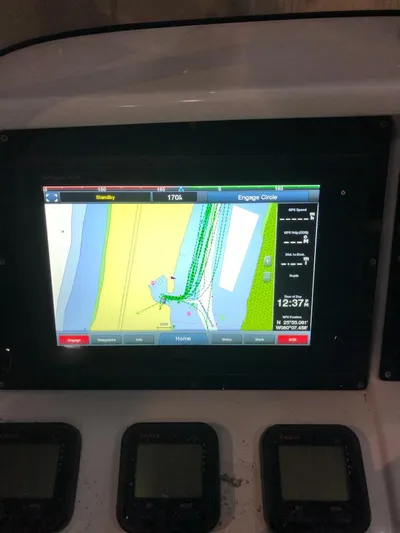  Yacht Photos Pics Navigation display on 2008 Intrepid 370 Cuddy boat, showing GPS map and controls.