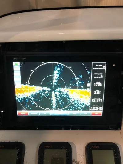  Yacht Photos Pics Garmin GPS display on 2008 Intrepid 370 Cuddy boat dashboard.
