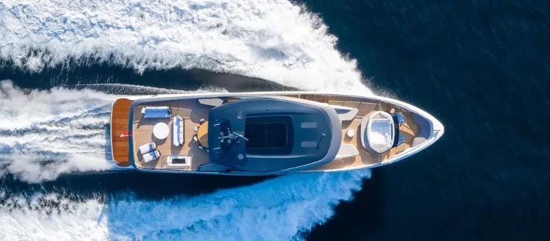  Yacht Photos Pics Aerial view of 2026 Princess X95 Vista yacht cruising on open water.