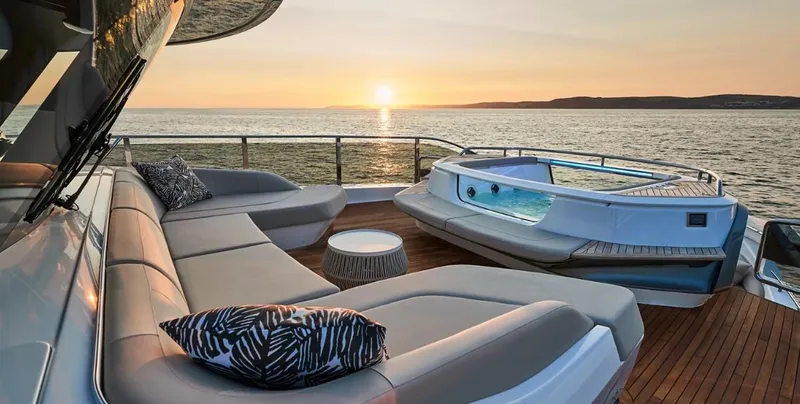  Yacht Photos Pics Luxurious 2026 Princess X95 Vista yacht deck with sunset view and jacuzzi.