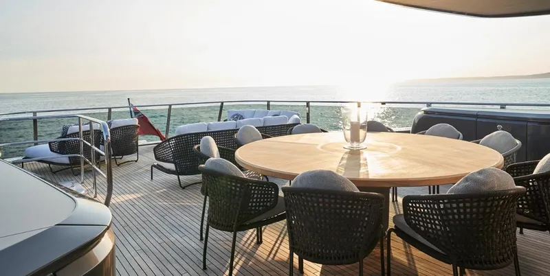  Yacht Photos Pics Luxurious deck of 2026 Princess X95 Vista yacht with ocean view and elegant seating.