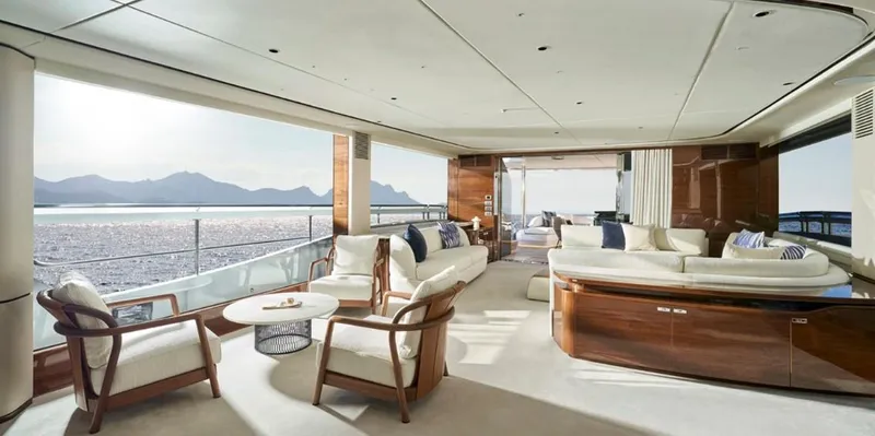  Yacht Photos Pics Luxurious interior of 2026 Princess X95 Vista yacht with elegant seating and ocean view.