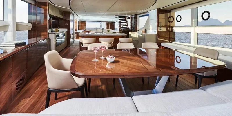  Yacht Photos Pics Luxurious interior of 2026 Princess X95 Vista yacht with elegant dining area and ocean views.