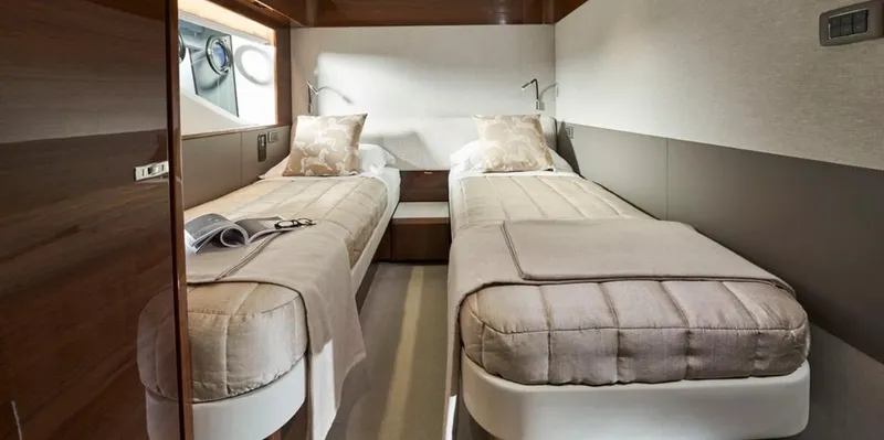  Yacht Photos Pics Luxurious twin cabin interior of 2026 Princess X95 Vista yacht, featuring elegant bedding and modern design.