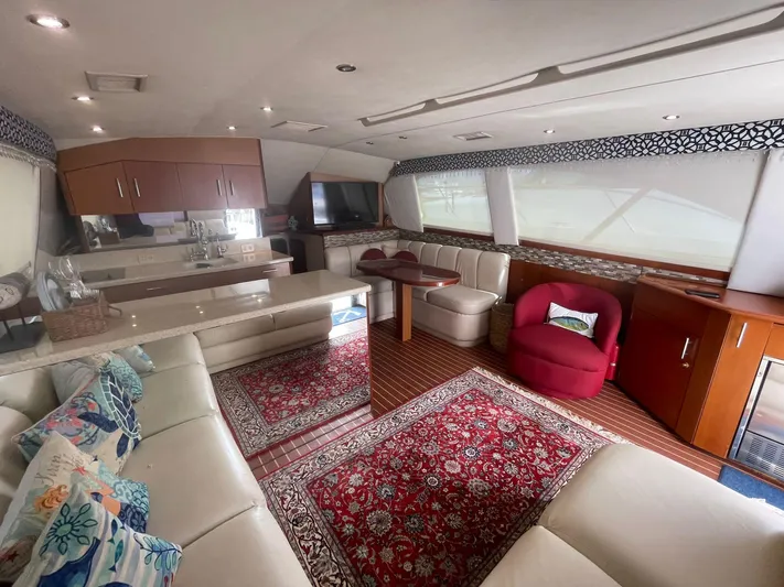  Yacht Photos Pics Luxurious interior of a 2000 Ocean Yachts Convertible with elegant seating and decor.