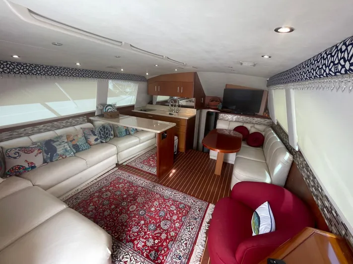  Yacht Photos Pics Luxurious interior of a 2000 Ocean Yachts Convertible with elegant seating and decor.