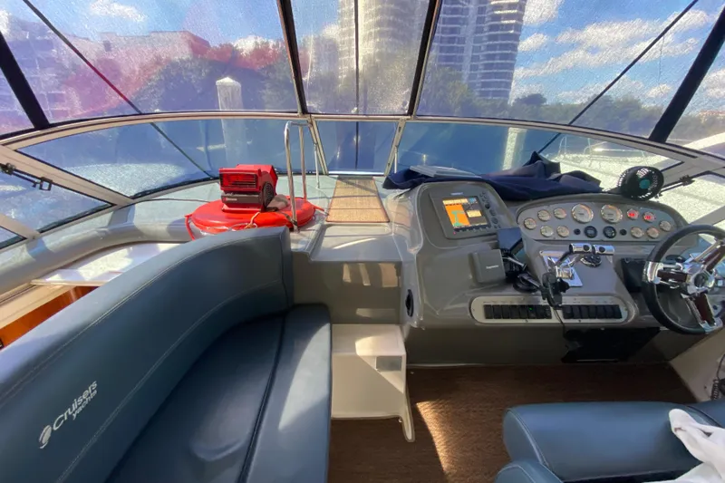  Yacht Photos Pics 2007 Cruisers Yachts 370 Express helm with modern controls and comfortable seating.