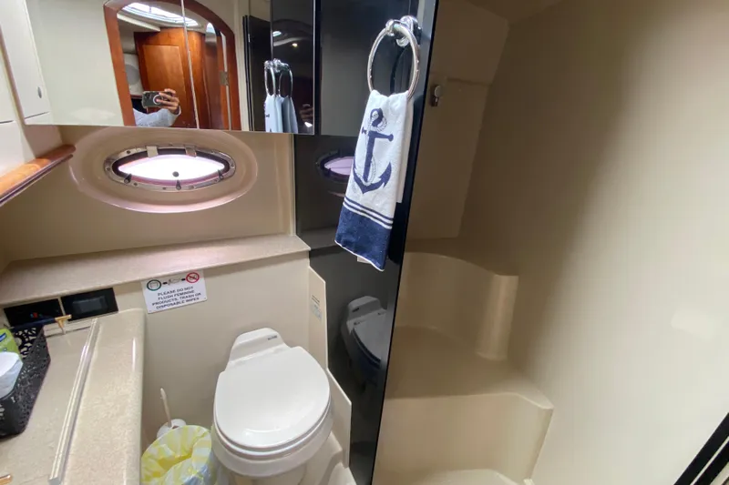  Yacht Photos Pics Bathroom interior of 2007 Cruisers Yachts 370 Express with nautical decor.