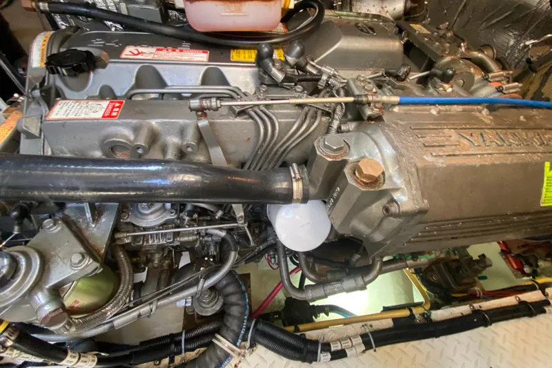  Yacht Photos Pics Engine compartment of a 2007 Cruisers Yachts 370 Express, showcasing detailed mechanical components.