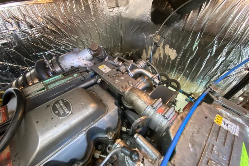  Yacht Photos Pics Engine compartment of a 2007 Cruisers Yachts 370 Express, featuring a Yanmar diesel engine.