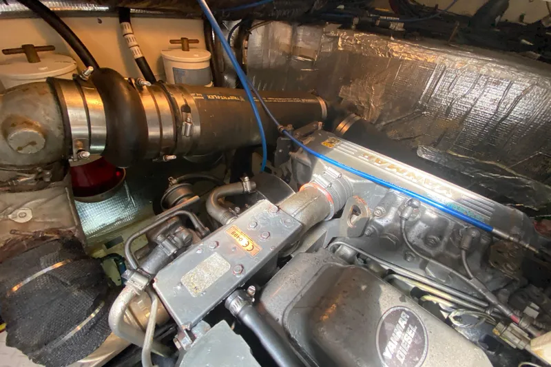  Yacht Photos Pics Engine compartment of a 2007 Cruisers Yachts 370 Express, featuring a Yanmar diesel engine.