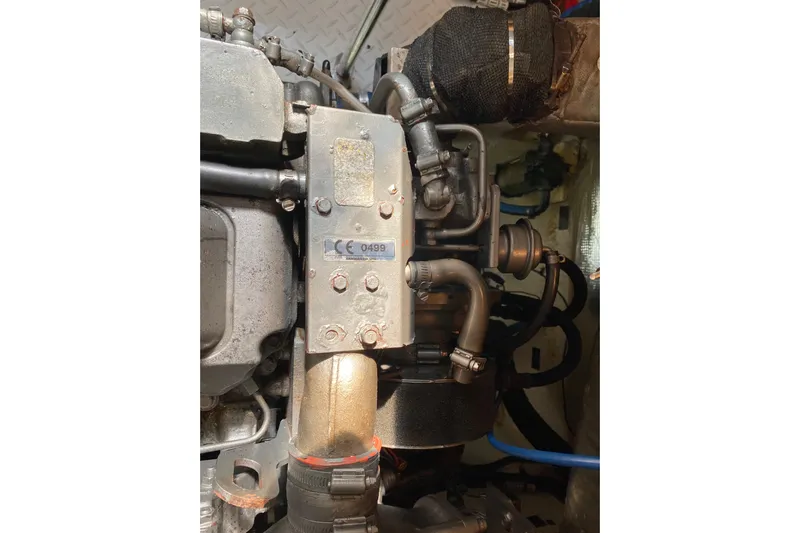  Yacht Photos Pics Engine compartment of a 2007 Cruisers Yachts 370 Express, showcasing mechanical components.