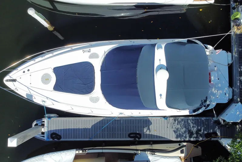  Yacht Photos Pics Aerial view of 2007 Cruisers Yachts 370 Express docked at marina.