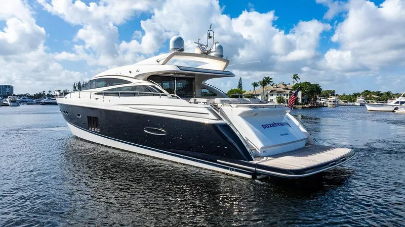  Yacht Photos Pics Luxurious 2010 Princess V78 yacht cruising on a sunny day, featuring sleek design and elegance.