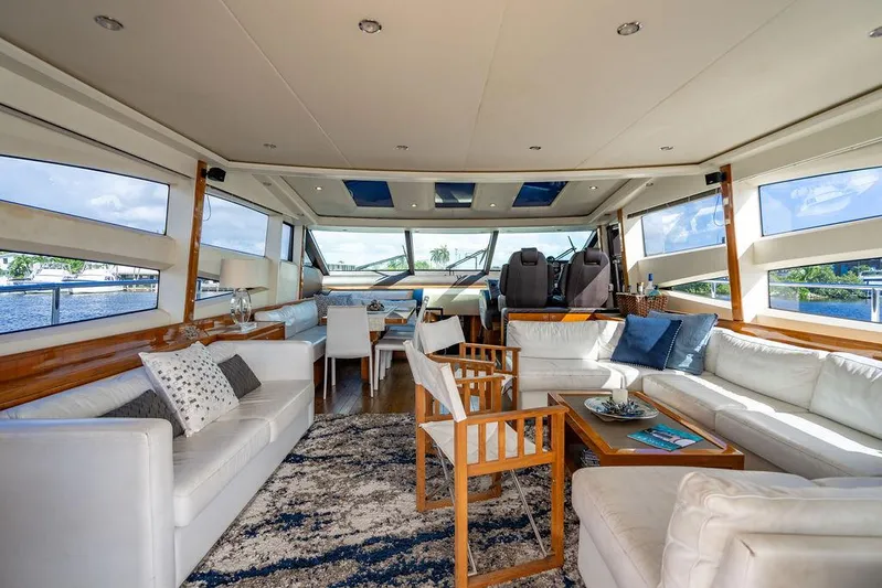  Yacht Photos Pics Luxurious interior of 2010 Princess V78 yacht with elegant seating and panoramic windows.