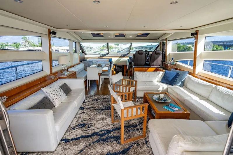  Yacht Photos Pics Luxurious interior of 2010 Princess V78 yacht with elegant seating and panoramic windows.