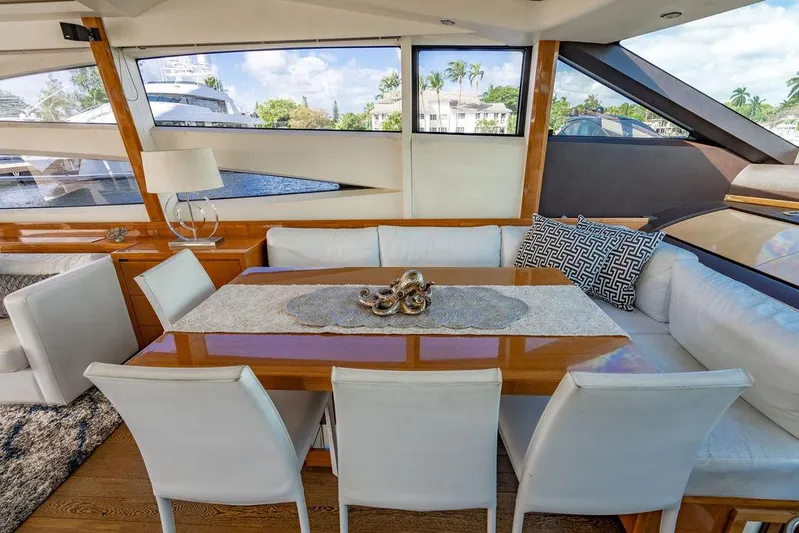  Yacht Photos Pics Luxurious 2010 Princess V78 yacht interior with elegant dining area and scenic windows.