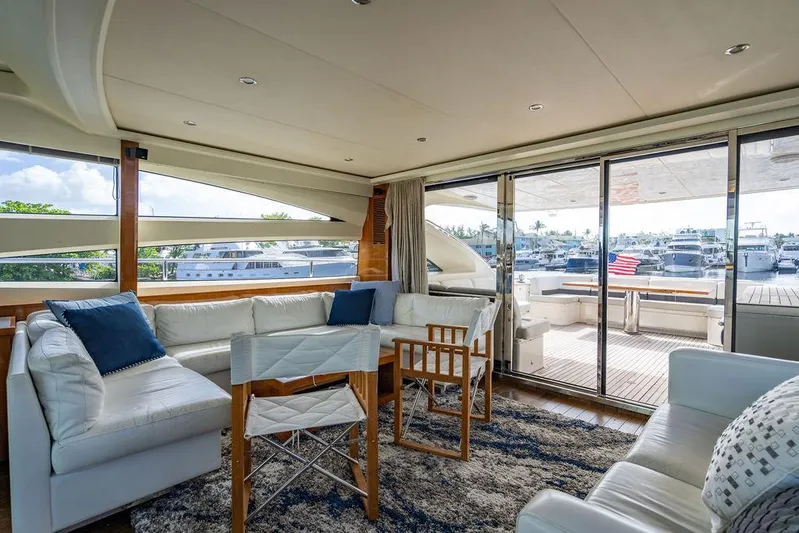  Yacht Photos Pics Luxurious 2010 Princess V78 yacht interior with elegant seating and marina view.