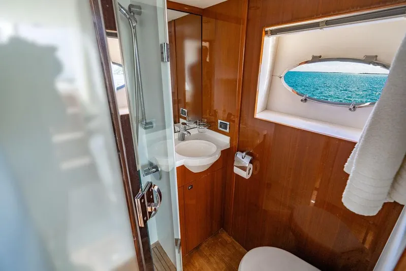  Yacht Photos Pics Luxurious bathroom on 2010 Princess V78 yacht with ocean view.