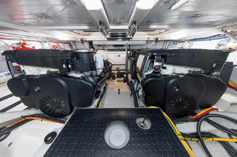  Yacht Photos Pics Engine room of 2022 Sabre 38 SE yacht, featuring dual engines and organized wiring.