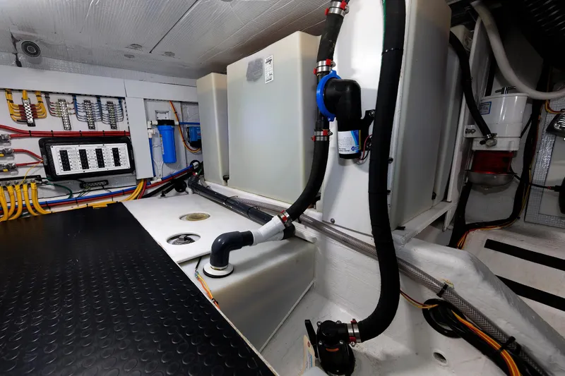  Yacht Photos Pics Engine room of 2022 Sabre 38 SE yacht with wiring and plumbing systems.