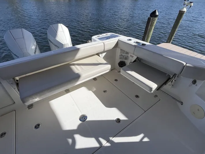  Yacht Photos Pics Boston Whaler 325 Conquest 2023 with Mercury engines at dock.