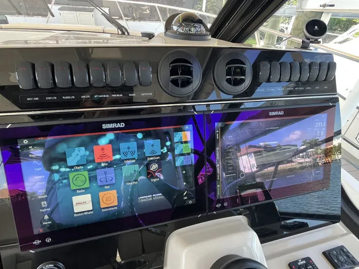  Yacht Photos Pics Dashboard of 2023 Boston Whaler 325 Conquest with Simrad displays.