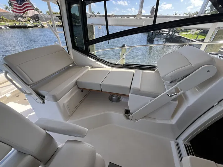  Yacht Photos Pics Interior of 2023 Boston Whaler 325 Conquest with comfortable seating.