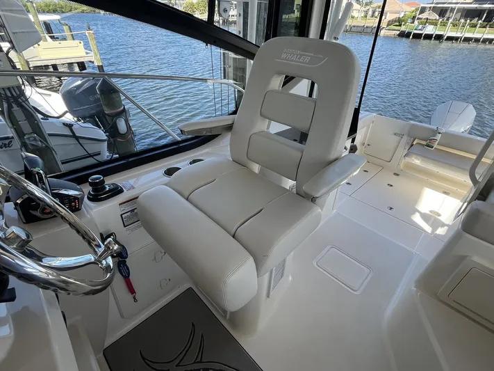  Yacht Photos Pics Interior of 2023 Boston Whaler 325 Conquest with helm station.