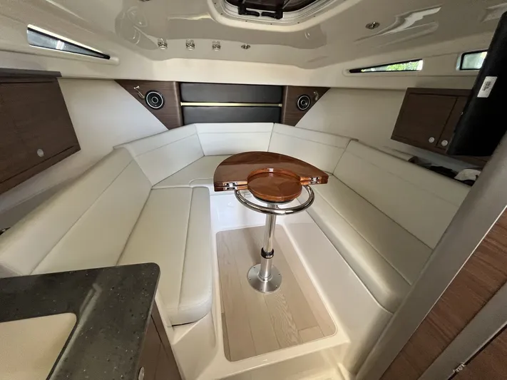  Yacht Photos Pics Interior of 2023 Boston Whaler 325 Conquest with elegant seating area.