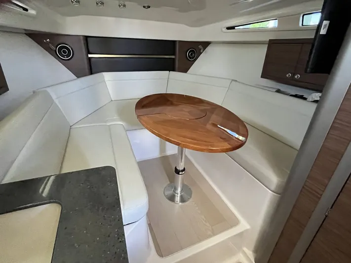  Yacht Photos Pics Interior of 2023 Boston Whaler 325 Conquest with elegant seating area.