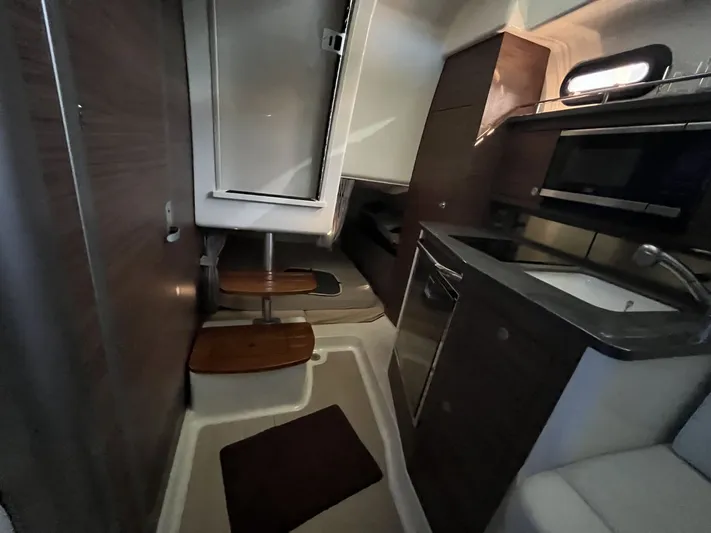  Yacht Photos Pics Interior of 2023 Boston Whaler 325 Conquest featuring modern kitchen.