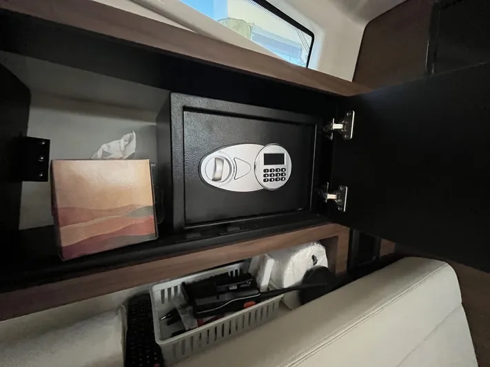  Yacht Photos Pics Interior of Boston Whaler 325 Conquest with safe and storage.