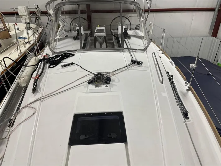 Rock Chalk Yacht Photos Pics 2016 Beneteau Oceanis 35 sailboat deck with dual steering wheels in storage.