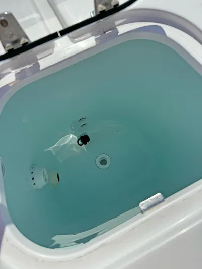  Yacht Photos Pics Livewell tank on 2025 Edgewater 340CC boat, filled with water.