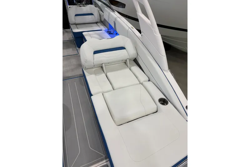  Yacht Photos Pics 2026 Regal LS6 Surf boat interior with luxurious white seating and modern design.