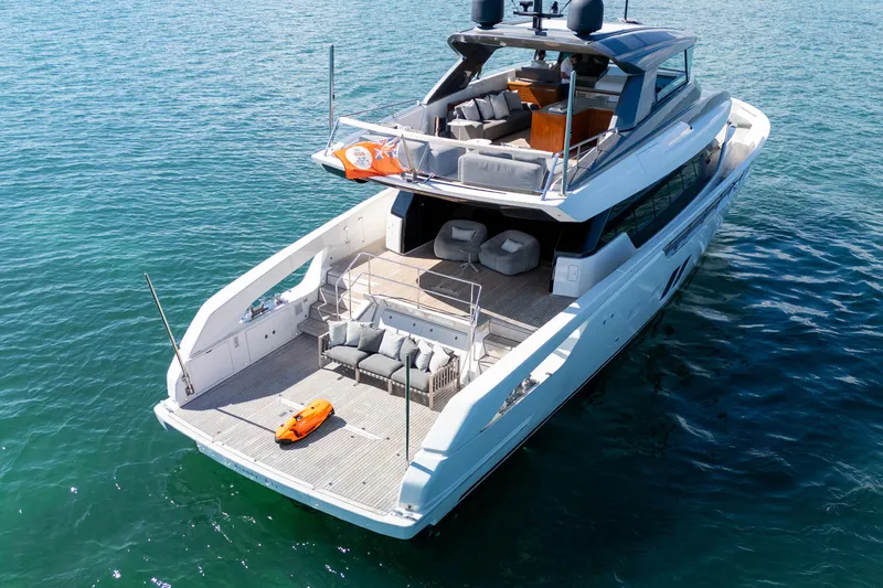 Vasiliki Yacht Photos Pics Luxurious 2019 Sanlorenzo SX76 yacht on serene blue waters, showcasing elegant design.
