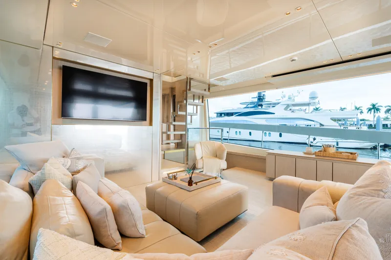Vasiliki Yacht Photos Pics Luxurious interior of 2019 Sanlorenzo SX76 yacht with plush seating and large windows.