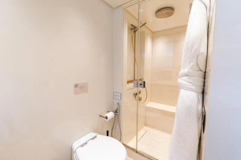 Vasiliki Yacht Photos Pics Luxurious bathroom on 2019 Sanlorenzo SX76 yacht with shower and robe.