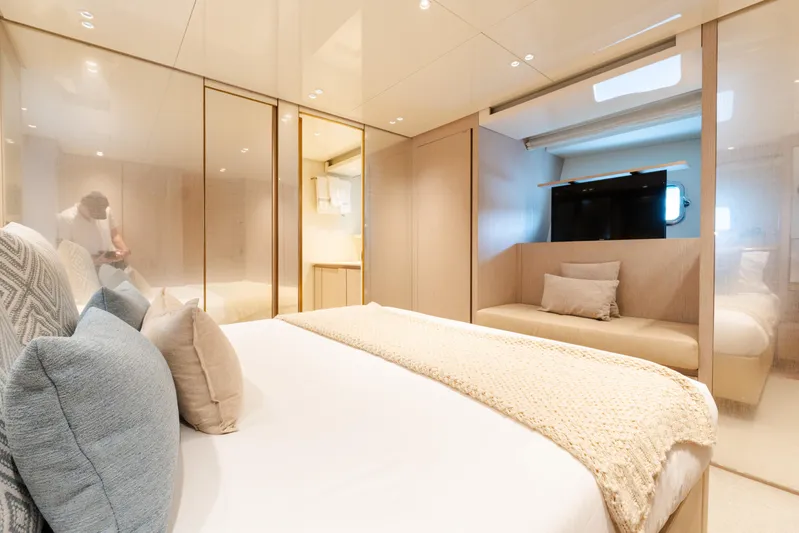 Vasiliki Yacht Photos Pics Luxurious 2019 Sanlorenzo SX76 yacht bedroom with modern decor and cozy bedding.