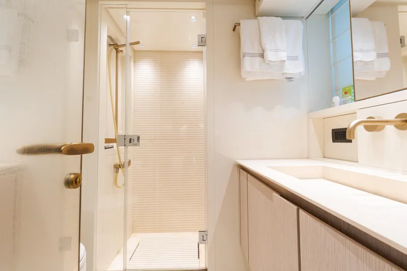 Vasiliki Yacht Photos Pics Luxurious bathroom interior of 2019 Sanlorenzo SX76 yacht, featuring modern shower and elegant fixtures.