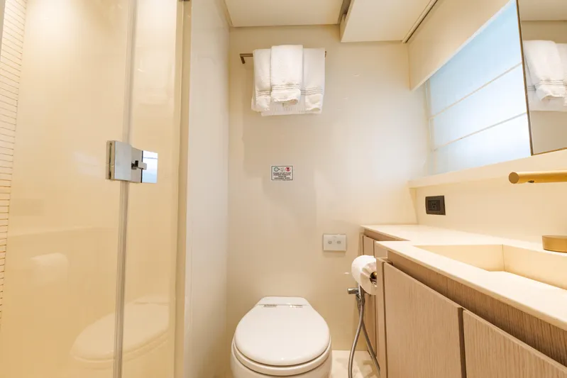 Vasiliki Yacht Photos Pics Luxurious bathroom in 2019 Sanlorenzo SX76 yacht, featuring modern fixtures and elegant design.