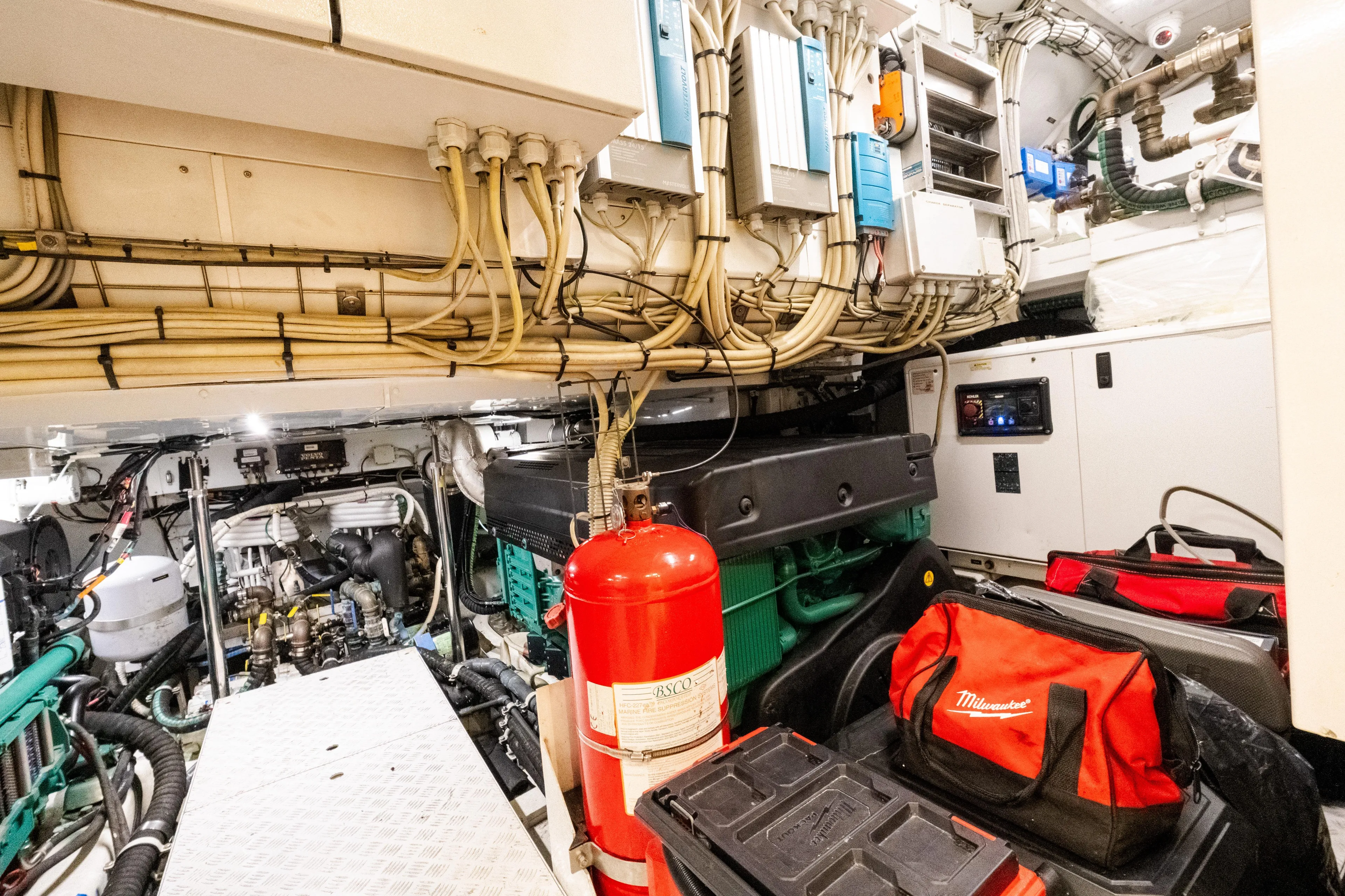 Vasiliki Yacht Photos Pics Engine room of 2019 Sanlorenzo SX76 yacht with wiring, equipment, and tools.