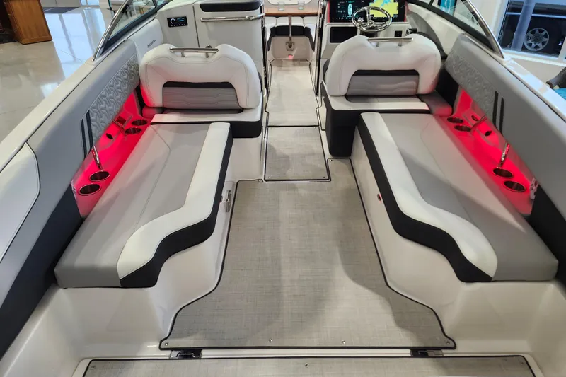  Yacht Photos Pics 2025 Regal LX6 boat interior with modern seating and ambient red lighting.