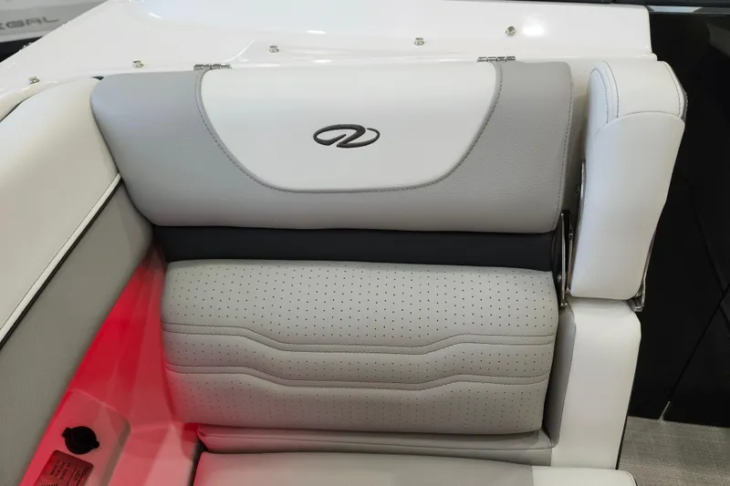  Yacht Photos Pics 2025 Regal LX6 boat seat with elegant gray upholstery and logo detailing.